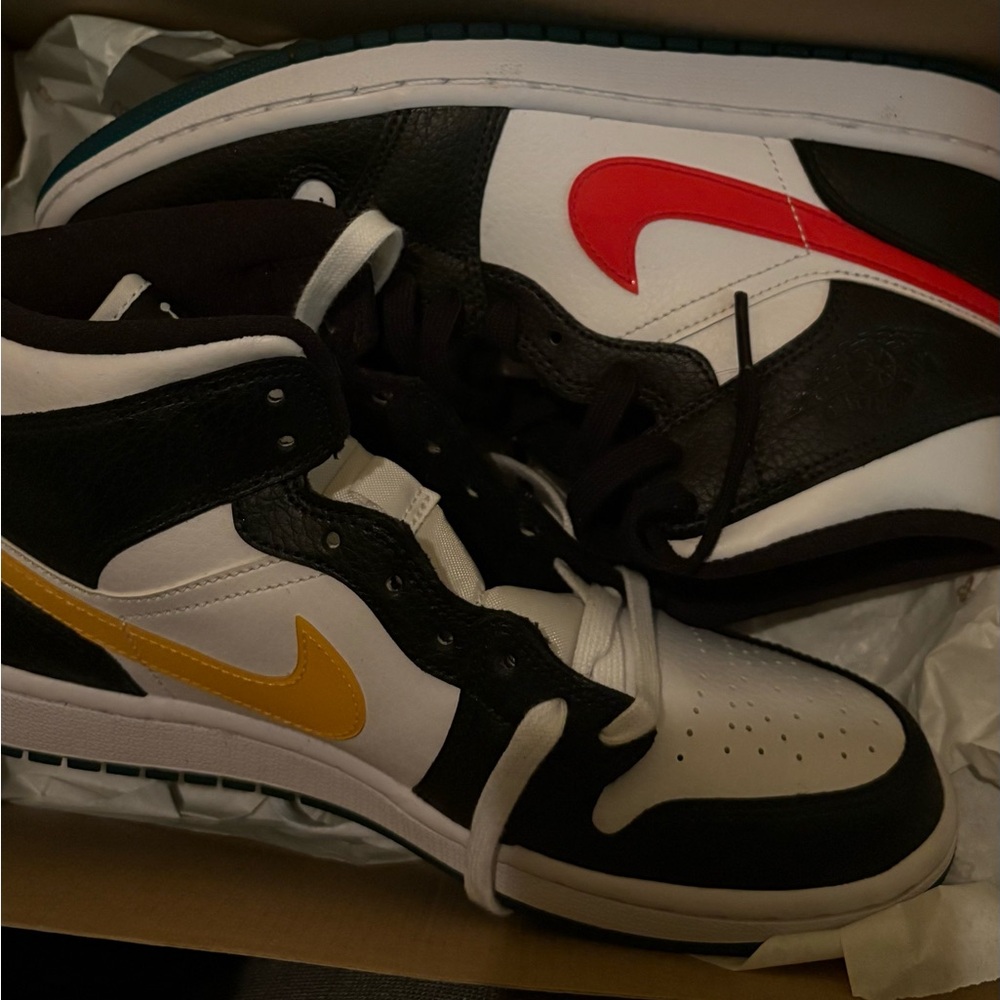 Jordan Air 1 Mid in Black, Red, and White